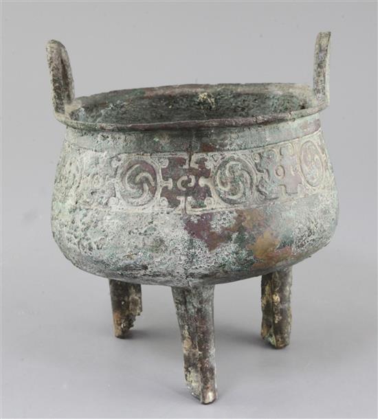 A Chinese archaic bronze tripod ritual food vessel, Ding, Western Zhou dynasty, 11th - 8th century BC, 22cm high, slight faults